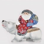 Скульптура "Дед Мороз с подарками на белом медведе"
