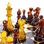 Шахматы из карельской березы с янтарными фигурами 25х25 см, фотография 10. Интернет-магазин ЛАВКА ПОДАРКОВ