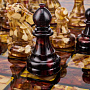 Шахматы с инкрустацией и фигурами из янтаря "Камелот" 45х45 см, фотография 8. Интернет-магазин ЛАВКА ПОДАРКОВ