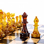 Шахматы из карельской березы с янтарными фигурами 25х25 см, фотография 5. Интернет-магазин ЛАВКА ПОДАРКОВ