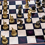 Шахматы с фигурами из бронзы "Деревенька" 48х48 см, фотография 6. Интернет-магазин ЛАВКА ПОДАРКОВ