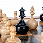 Шахматы из карельской березы с деревянными фигурами "Непобедимые" 45х45 см, фотография 7. Интернет-магазин ЛАВКА ПОДАРКОВ