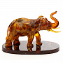 Скульптура из янтаря "Слон", фотография 1. Интернет-магазин ЛАВКА ПОДАРКОВ