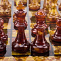 Шахматы с инкрустацией и фигурами из янтаря 30х30 см, фотография 9. Интернет-магазин ЛАВКА ПОДАРКОВ