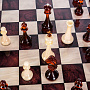 Шахматы деревянные с янтарными фигурами 48х48 см, фотография 7. Интернет-магазин ЛАВКА ПОДАРКОВ