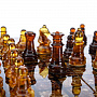 Шахматы с инкрустацией и фигурами из янтаря 32х32 см, фотография 7. Интернет-магазин ЛАВКА ПОДАРКОВ