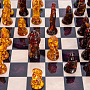 Шахматы с янтарными фигурами "Ледовое побоище" 48х48 см, фотография 4. Интернет-магазин ЛАВКА ПОДАРКОВ