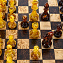Шахматы из карельской березы с янтарными фигурами 25х25 см, фотография 7. Интернет-магазин ЛАВКА ПОДАРКОВ