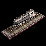 0058948 Бронза СКУЛЬПТУРА "Паровоз"литье, серебрение/чернение,на подставке, в П/У