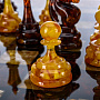 Шахматный ларец с инкрустацией и фигурами из янтаря 65х65 см, фотография 11. Интернет-магазин ЛАВКА ПОДАРКОВ
